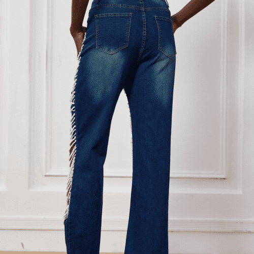 SeraphinaTornChainCutoutJeans 1